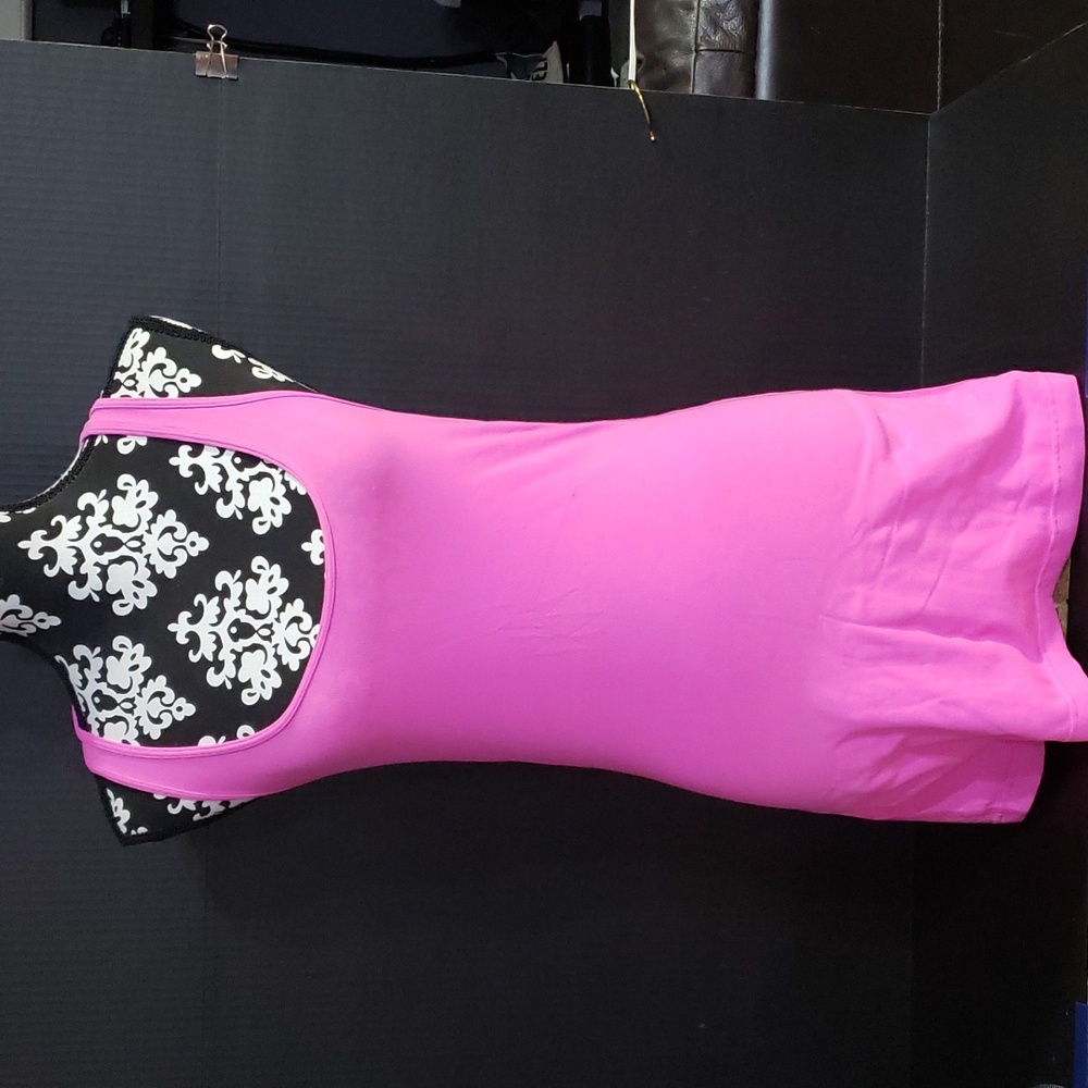 Lululemon Women's Pink Racerback Scoop Neck Yoga Tank Top. Size unknown maybe M.